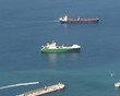 Close up of tanker zooming out to reveal Spain in distance Close up of tanker zooming out to reveal Spain in distance