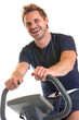 Man sitting on spinning bicycle