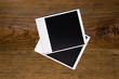 Blank photo frames over wood