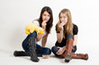 Girlfriends eaiting chips with yellow duck