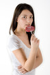 Brown hair girl and a lollipop
