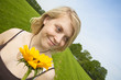 Foto: Girl with a sunflower Girl with a sunflower