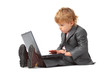 Boy in suit with notebook
