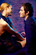 Young happy amorous attractive couple at night club Young happy amorous attractive couple at night club