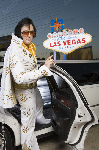 Photo: Elvis impersonator getting into limo in Las Vegas, Nevada, USA Elvis impersonator getting into limo in Las Vegas, Nevada, USA