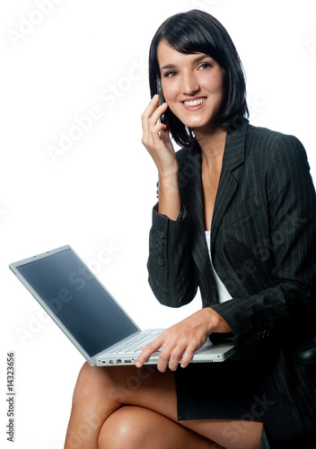 Businesswoman with Laptop and Phone