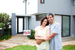 Newlyweds with their new house