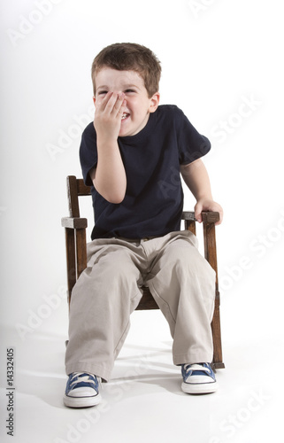 Photo: Laughing young boy Laughing young boy