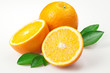 Oranges with leaves on white