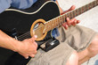 Photo: Tuning a Guitar Tuning a Guitar
