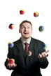 Foto: Businessman juggling Businessman juggling