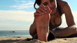Video: Young woman performing yoga stretches on the beach - HD Young woman performing yoga stretches on the beach - HD