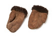 Sheepskin mittens or gloves isolated on a white background.