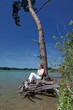 blonde female enjoying the nature at a lake