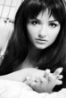 Beautiful young woman in bed