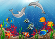 Underwater world with dolphins and tropical fishes