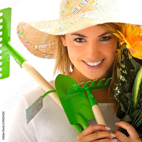 Photo: girl portrait with gardening tools girl portrait with gardening tools