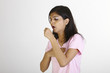 Girl with  cough in pink dress