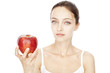 Young woman holding red apple
