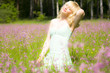 Young woman in pink flowers Young woman in pink flowers