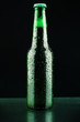 Close up shot of Beer bottle on a black background Close up shot of Beer bottle on a black background