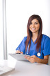 Woman doctor holding a chart in a modern office