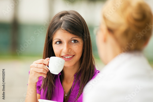 Photo: businesswomen drinking coffee businesswomen drinking coffee