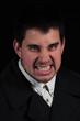 Angry male portrait isolated on black background Angry male portrait isolated on black background