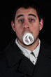 funny male with lightbulb in mouth isolated on black background funny male with lightbulb in mouth isolated on black background