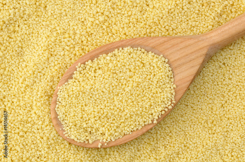 Photo: Semolina couscous background Semolina couscous background