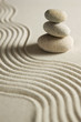 Stack of stones on raked sand