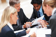 Team of business people working hard in the office