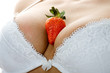 Women with strawberry in her breast.