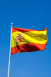 Flag of Spain with Blue Sky
