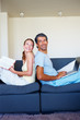 Happy couple relaxing at their home