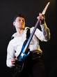 performer playing the guitar performer playing the guitar
