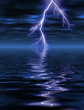 Lightning in the night over the water