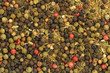 Whole peppercorns background