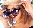 woman with hat and sunglasses in summer time woman with hat and sunglasses in summer time