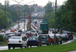 Rush hour traffic lined up car by car on the downtown streets