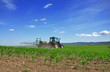 Tractor plowing the fields back