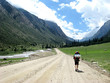 Man with backpack walking in mountain