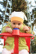 Baby on swing