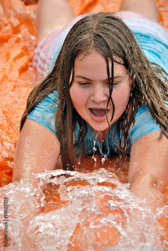 Photo: Playing on Water Slide Playing on Water Slide