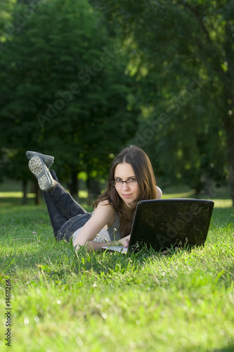 Photo: student with laptop outdoors student with laptop outdoors