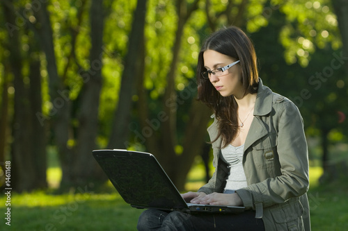 Photo: student with laptop outdoors student with laptop outdoors