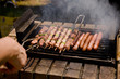 Grill Barbecue Shish-kebab with serving hand Grill Barbecue Shish-kebab with serving hand