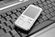 technology. phone on laptop