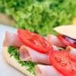 Sandwich with fresh vegetables, ham and cheese Sandwich with fresh vegetables, ham and cheese
