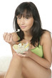 Young woman eating sweets